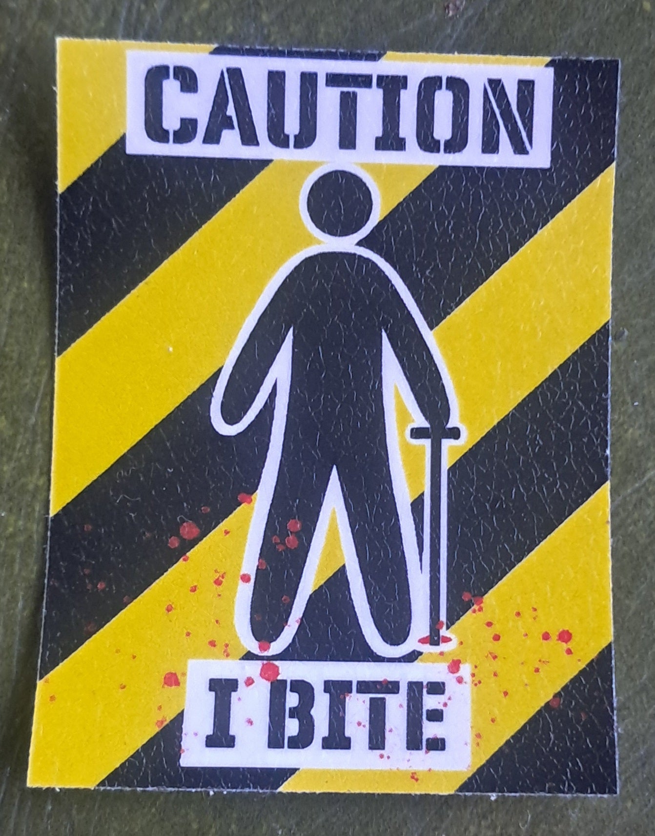 CAUTION I BITE sticker